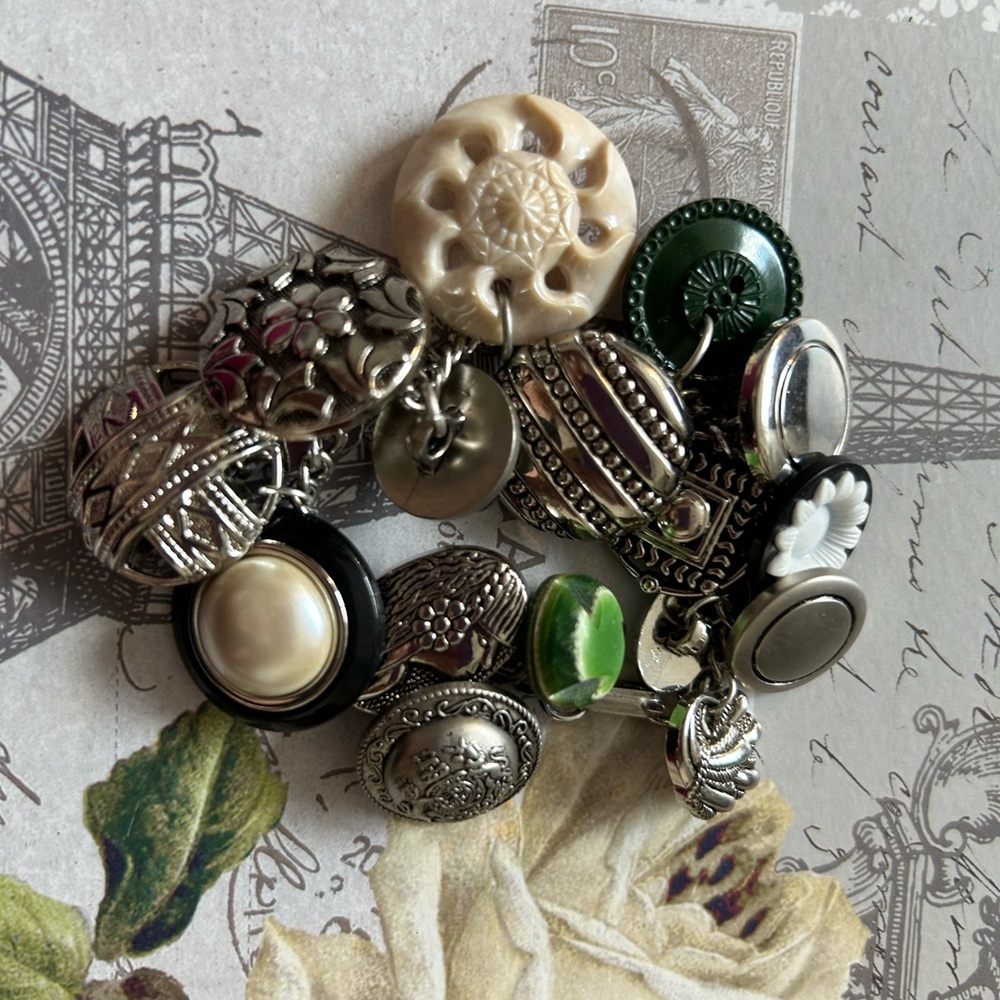 PACKED CHARM BRACELET FULL OF VINTAGE BUTTONS